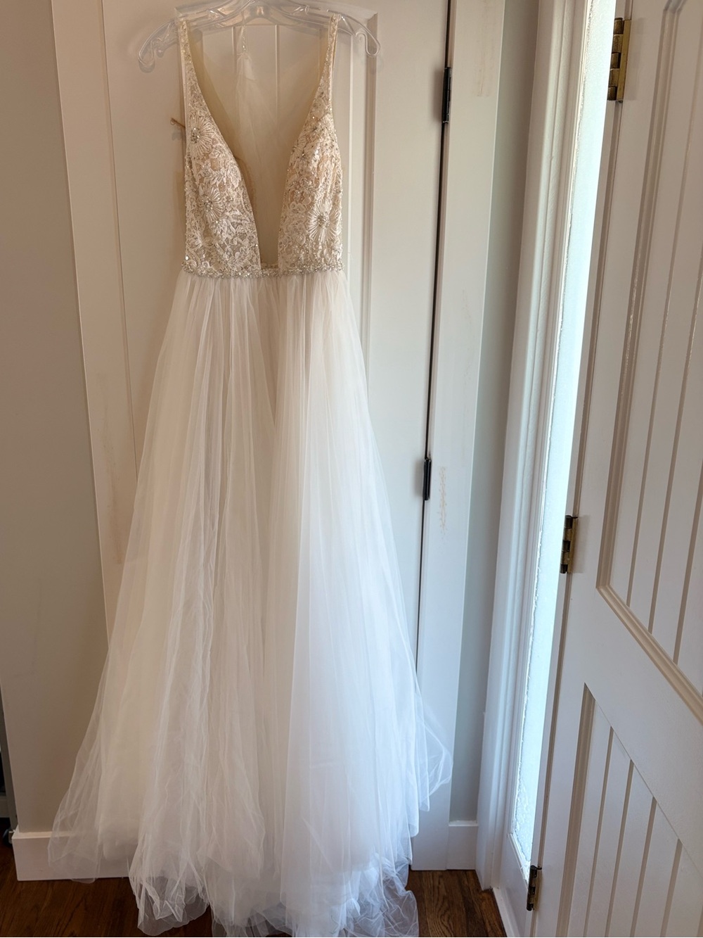 Unworn Allure Bridals A-line Gown with Plunging Vneck and lace bodice. Size 12